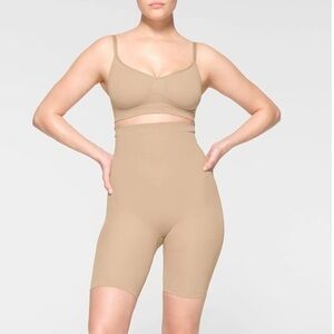 Skims high waisted above the knee seamless sculpt
